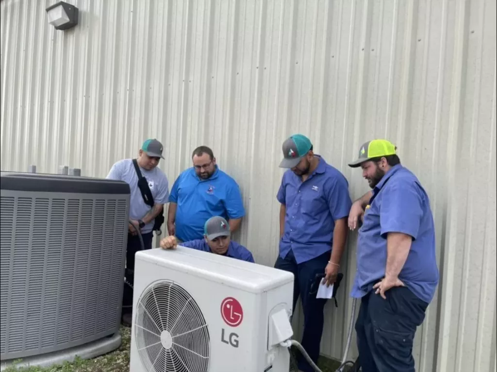 Texas Ace Crew Working on an LG HVAC system.