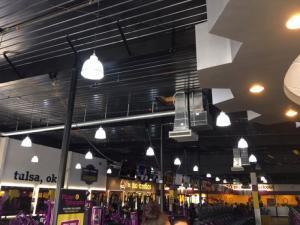 HVAC units installed on the roof of a Planet Fitness in Tulsa, OK.