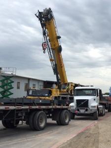 Crane used for hoisting HVAC material near Dallas, TX.